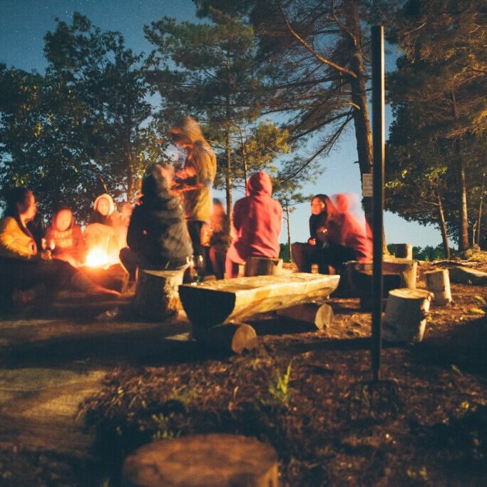 Team having bonfire
